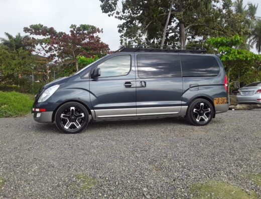 Modern Waverii transportation van designed for comfortable group travel, featuring sleek black exterior and spacious interior, ideal for Soul Tours Transportations.