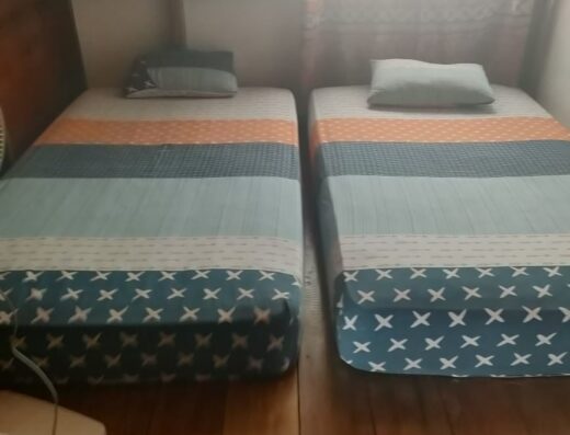 Beachfront rooms with twin beds and ocean views.