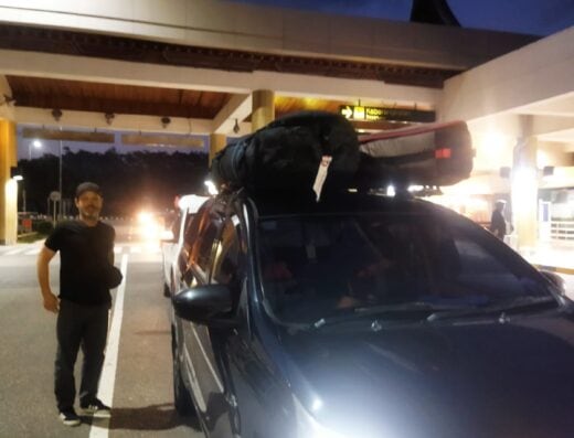 Transportation service at Padang Airport with Mr Yopy vehicle ready for drop-off or pickup in West Sumatera.